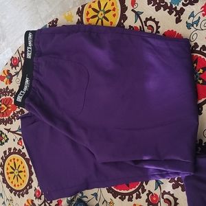 2 pairs of Purple scrubs